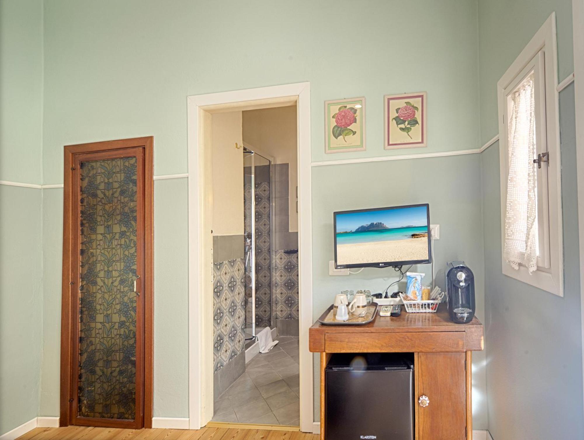 Отель Casa Satta 1925 Ольбия Номер фото